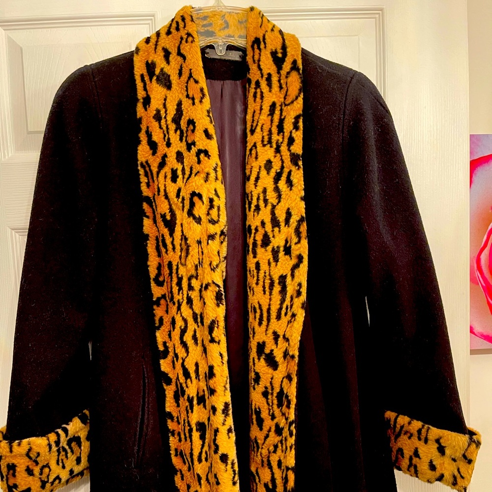 Very good quality swing Coat with Faux Fur Trim.